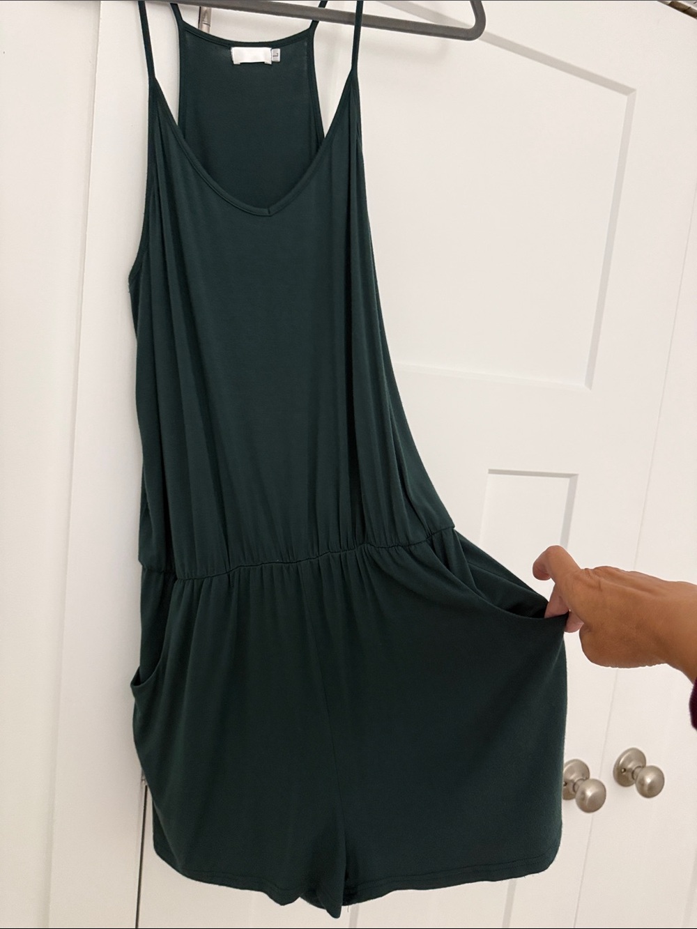 Dark Green Sleeveless Romper. L. ptp 19” inseam 2” shoulder to waist 25”